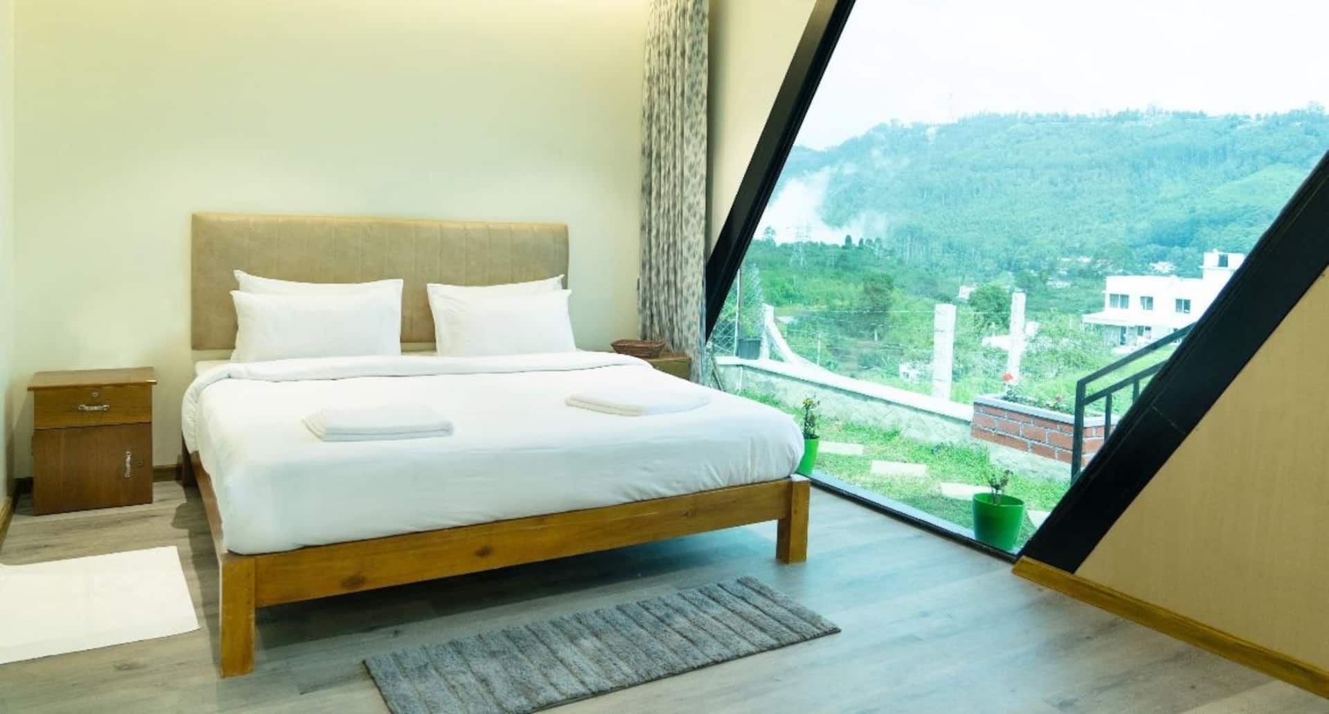 Bedroom with A-frame picture window